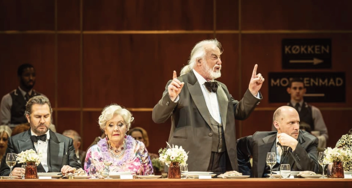 Festen by Mark-Anthony Turnage; JT as Grandpa with Thomas Oliemans, Susan Bickley, Stephane Degout; Director: Richard Jones; ROH; Feb 2025; photo: Marc Brenner - homeSlides
